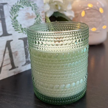 Morning Rain soy candle with green leaves, rose, lily, sandalwood, and ozone. Crackling wood wick, 40-50 hours burn time, phthalate-free.