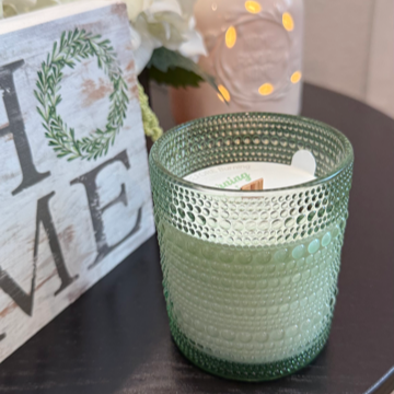 Morning Rain soy candle with green leaves, rose, lily, sandalwood, and ozone. Crackling wood wick, 40-50 hours burn time, phthalate-free.