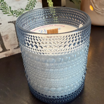 Vintage Lace soy candle with notes of cotton, lavender, lily, vanilla, musk, and birchwood. Clean, phthalate-free, reusable blue bubble jar.