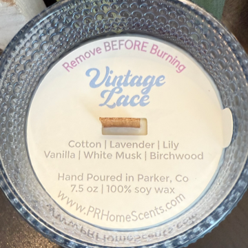 Vintage Lace soy candle with notes of cotton, lavender, lily, vanilla, musk, and birchwood. Clean, phthalate-free, reusable blue bubble jar.
