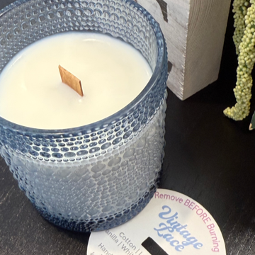 Vintage Lace soy candle with notes of cotton, lavender, lily, vanilla, musk, and birchwood. Clean, phthalate-free, reusable blue bubble jar.