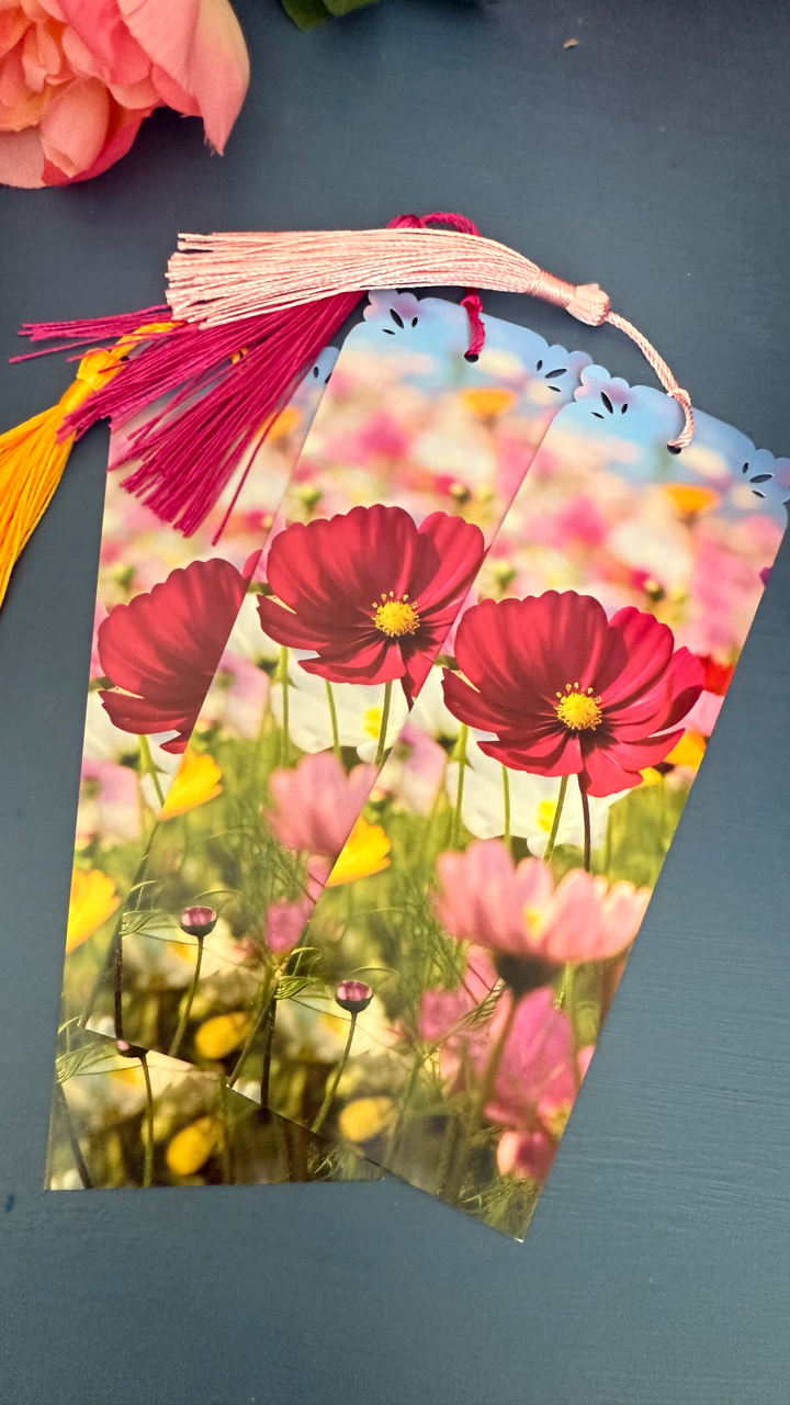 Handmade floral bookmark with tassel, featuring Ephesians 3:20 Bible verse on the back. Perfect for gifts and daily inspiration. 6"x2".