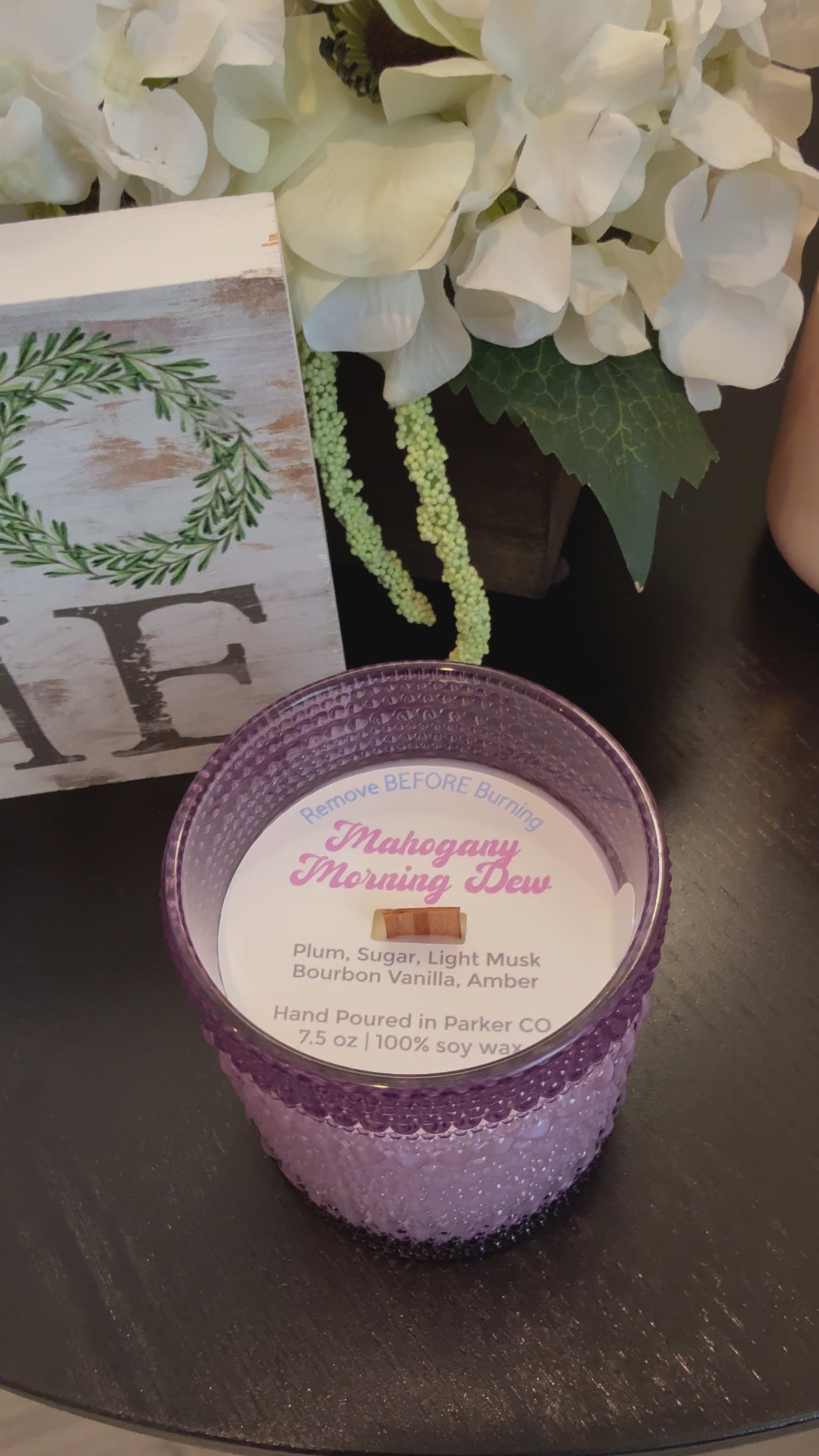 Hand-poured soy candle with notes of plum, sugar, bourbon vanilla, musk, and amber. Phthalate-free, reusable vintage bubble jar. Made in Colorado.
